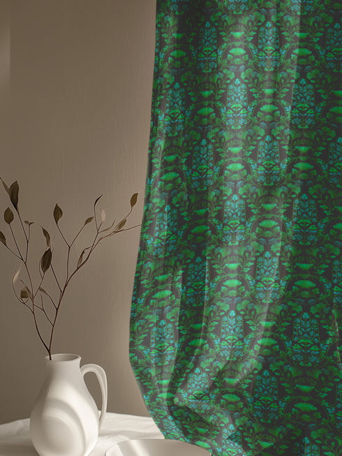 Sheer curtain panel featuring repeating emerald green hamsa hands with blue botanical elements on dark background. Linen-textured polyester fabric filters light beautifully while providing elegant window covering with protective symbolism for bohemian or Victorian interiors.